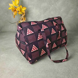 Weekender Travel Bag Black Colour with Sandal and Red Triangle Design.